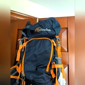Navy Blue Hiking Backpack with Padded Straps and Bright Orange Accents